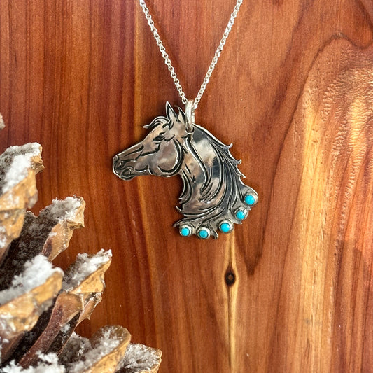 Sterling silver horse head pendant with turquoise stones