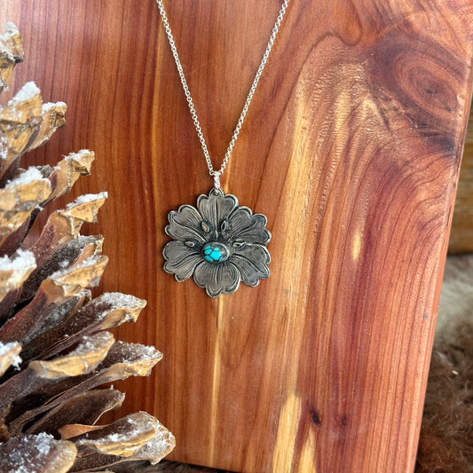 sterling silver flower pendant with turquoise stone