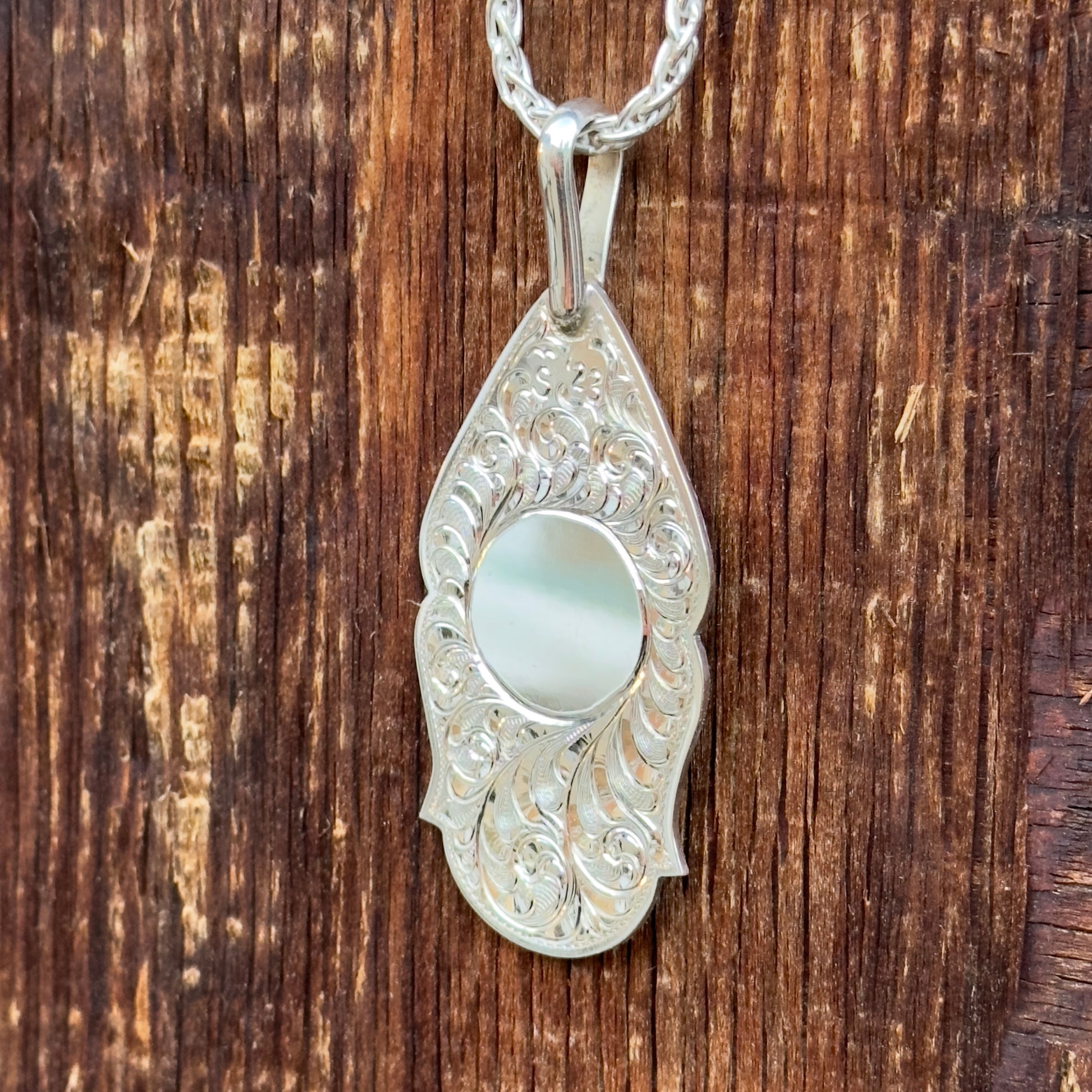 pendant with place to engrave brand or initials